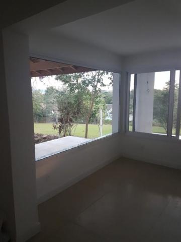 Casa espaçosa com 4 quartos, 320 m² - Condomínio Chácaras Cataguá - Taubaté/SP