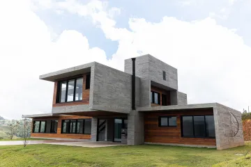 Casa com 4 suítes, à venda por R$ 4.900.000,00 - Condomínio Iporanga - Campos do Jordão/SP