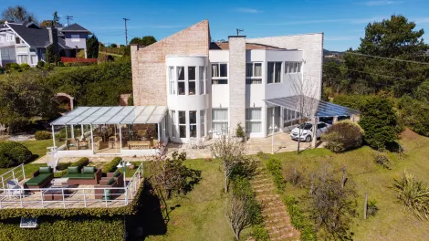 Casa com 4 suítes, 700 m² - Condomínio Iporanga - Campos do Jordão/SP