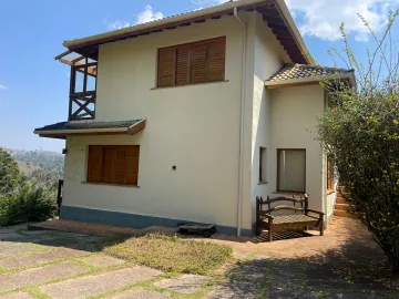 Casa com 3 suítes, 332 m² - Condomínio Florestal Clube - Campos do Jordão/SP.